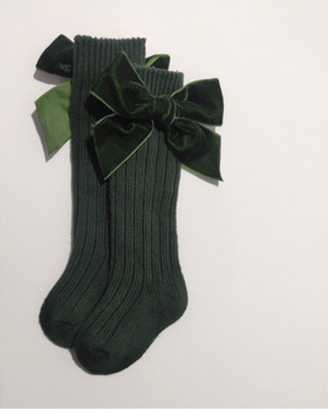 Oluuu. Baby Wollsocken mit Schleifen-Design