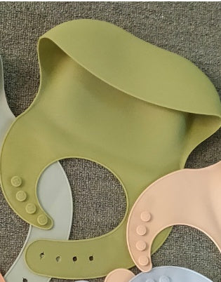 Oluuu. Weiches Wasserdichtes Silikon Baby Lätzchen mit Auffangtasche