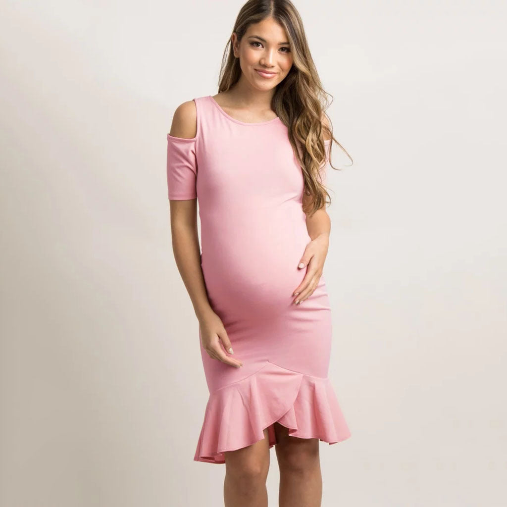 Oluuu. Schwangerschafts-Kleid mit temperamentvollem Flair