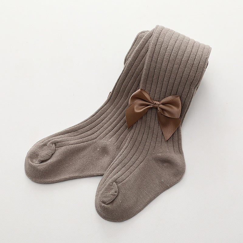 Oluuu. Kinder Socken mit einfarbiger Schleife