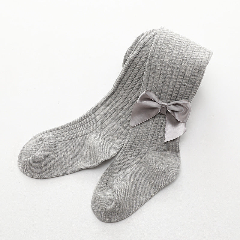 Oluuu. Kinder Socken mit einfarbiger Schleife