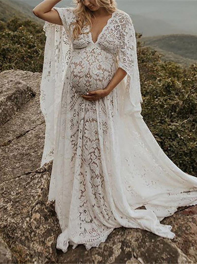 Oluuu. Schwangerschafts-Lace Kleid mit weitem, flauschigem Saum