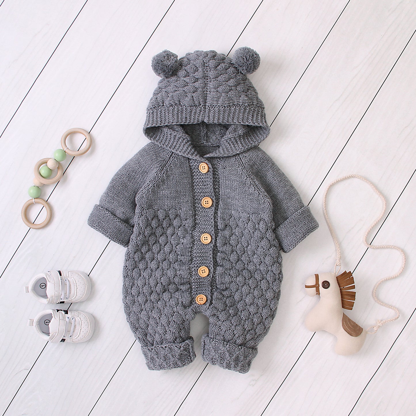 Oluuu. Baby Strick-Jumpsuit