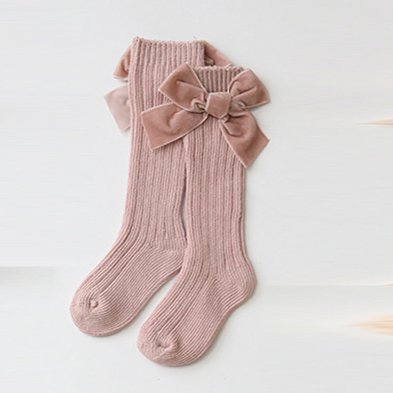 Oluuu. Baby Wollsocken mit Schleifen-Design