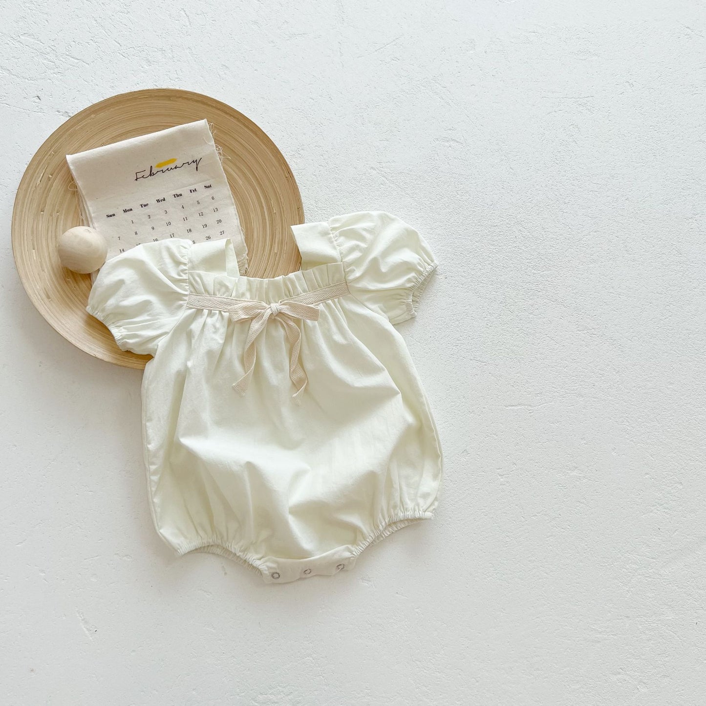 Oluuu. Baby Mädchen Puffärmel Strampler mit Schleifen-Knoten