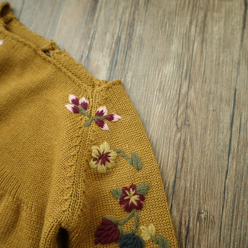 Oluuu. Baby Langarm Kleid mit Stickerei – Woll-Wickel für den Po