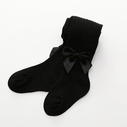 Oluuu. Kinder Socken mit einfarbiger Schleife
