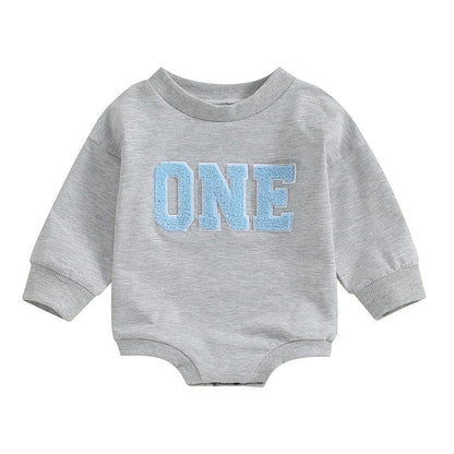 Oluuu. Baby Jumpsuit – Festlicher Romper mit Stickerei