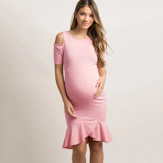 Oluuu. Schwangerschafts-Kleid mit temperamentvollem Flair