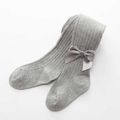 Oluuu. Kinder Socken mit einfarbiger Schleife
