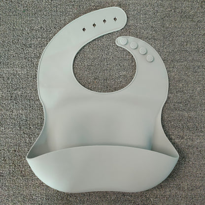Oluuu. Weiches Wasserdichtes Silikon Baby Lätzchen mit Auffangtasche