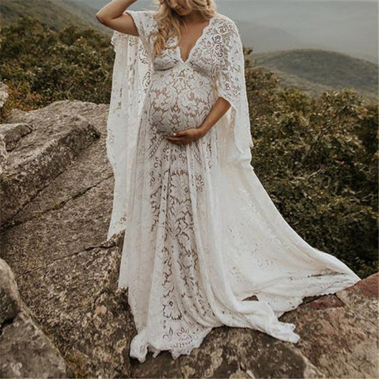 Oluuu. Schwangerschafts-Lace Kleid mit weitem, flauschigem Saum